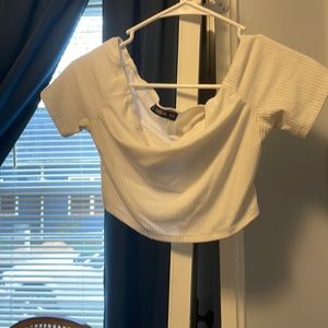 White off the shoulder .